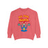 A Christmas sweatshirt featuring a playful design with a cartoon Baphomet goat character wearing a Santa hat. The design includes the text "All Hail Santa" above the goat, with pentagrams in flames on either side. The goat is depicted in a meditative pose, adding a humorous and irreverent twist to holiday attire.